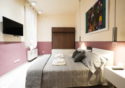 badia-rosa-centro-storico-blu-s-immobiliare-affitti-brevi-modena-italia-camera-da-letto